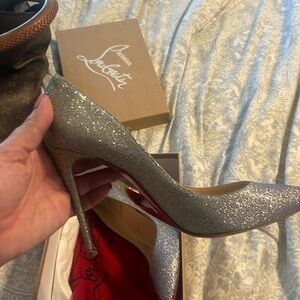 Loubs silver glitter red bottoms size 40